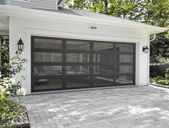 New Albany Garage Door Repair design specialist presenting custom garage door options to New Albany homeowner